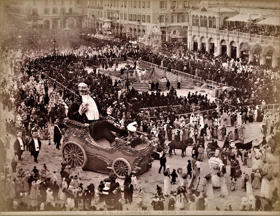Vintage photograph of the Nice Carnival parade with giant float and costumed crowd, 1896