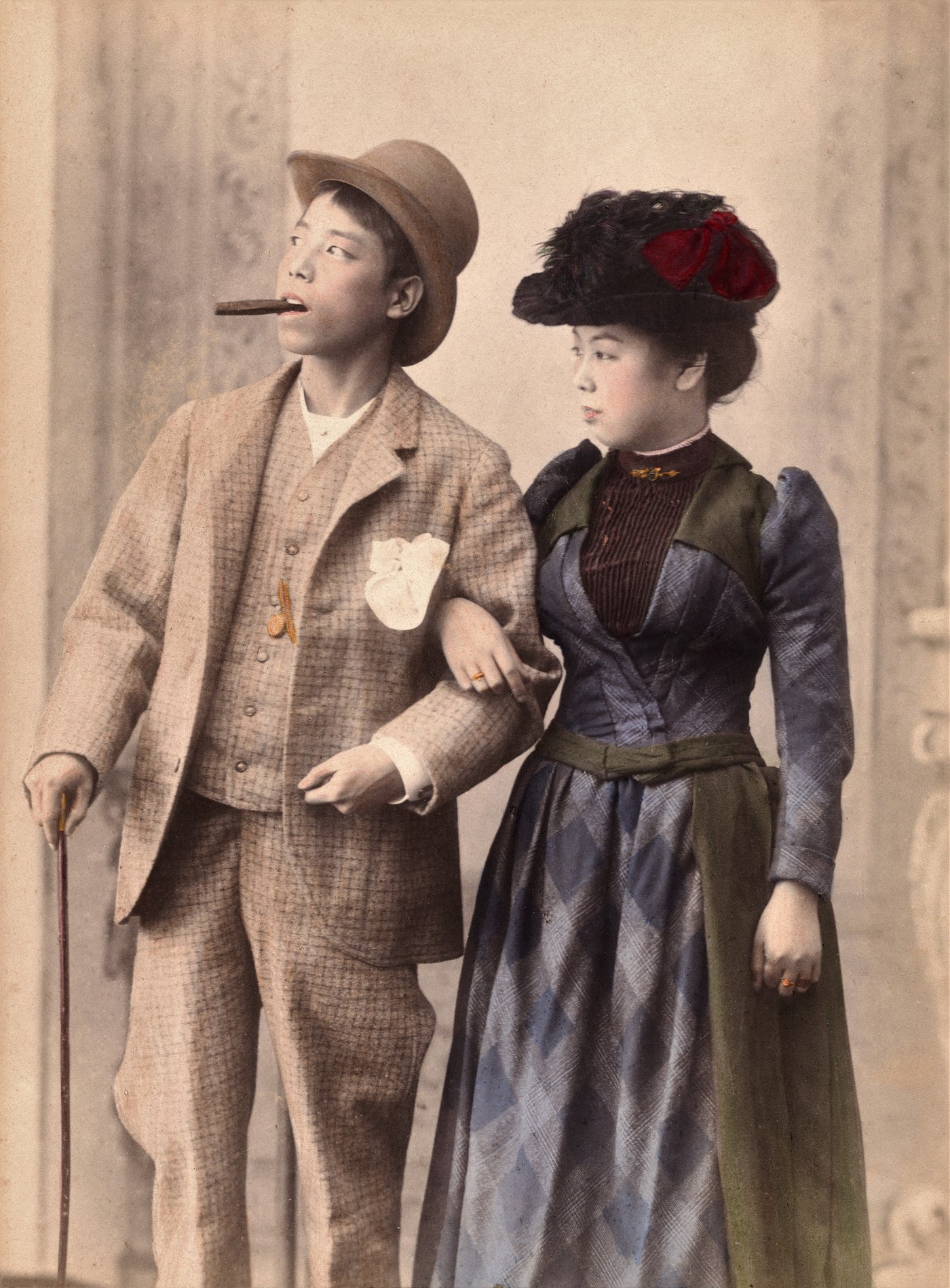 Hand-colored Meiji-era photo by Kusakabe Kimbei of a Japanese couple in Western Victorian clothing, museum-quality reproduction print