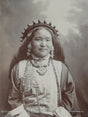 1890s studio portrait of a Bhutia woman in Darjeeling wearing traditional dress and jewelry