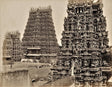 Sepia-toned 19th-century photograph of the Meenakshi Amman Temple in Madurai, featuring intricately carved Dravidian gopurams (gateway towers)