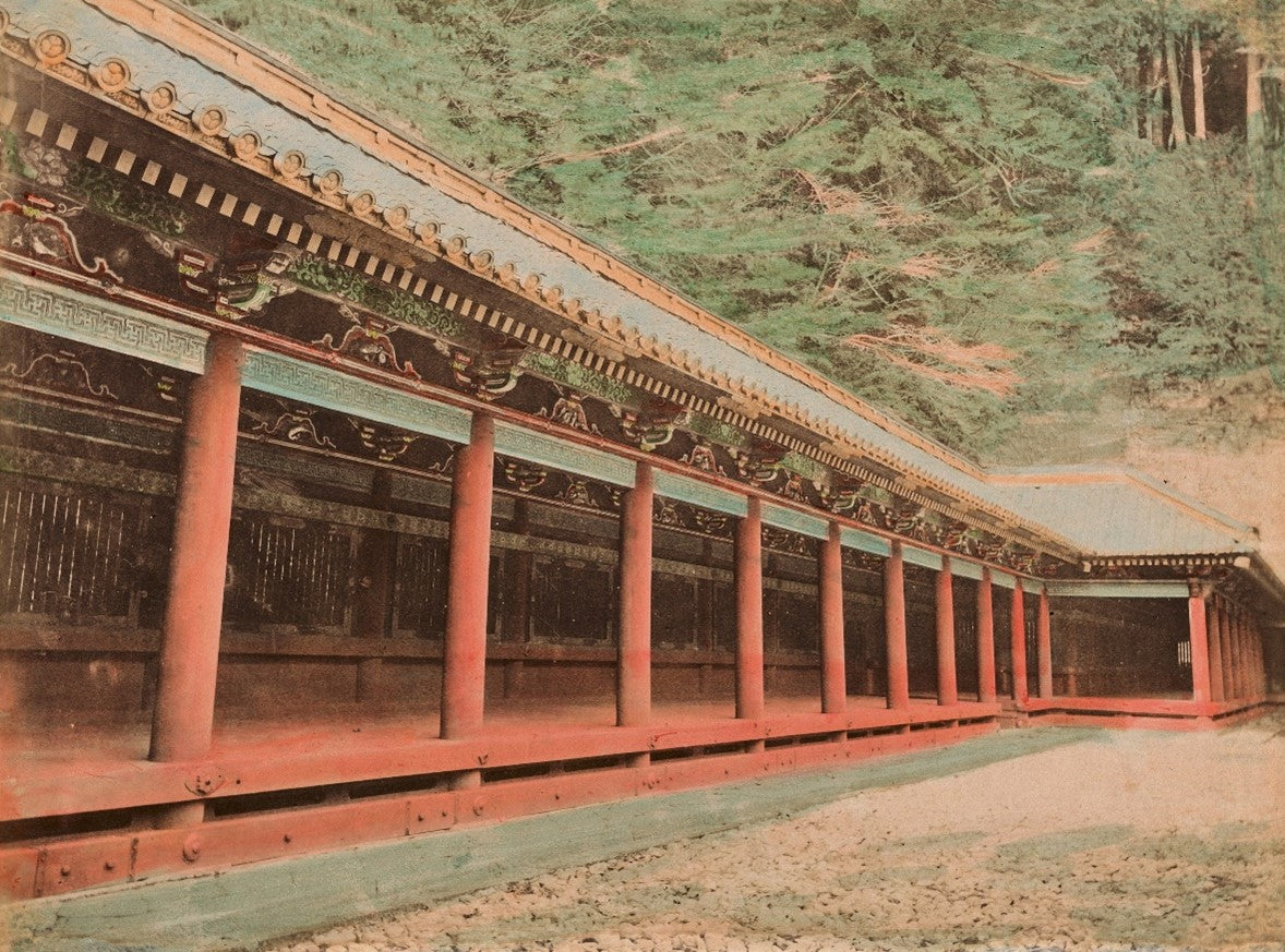 Hand-colored Meiji-era photograph of a covered temple corridor in Miyagino, Hakone, Japan, with red columns and ornate roof detailing.